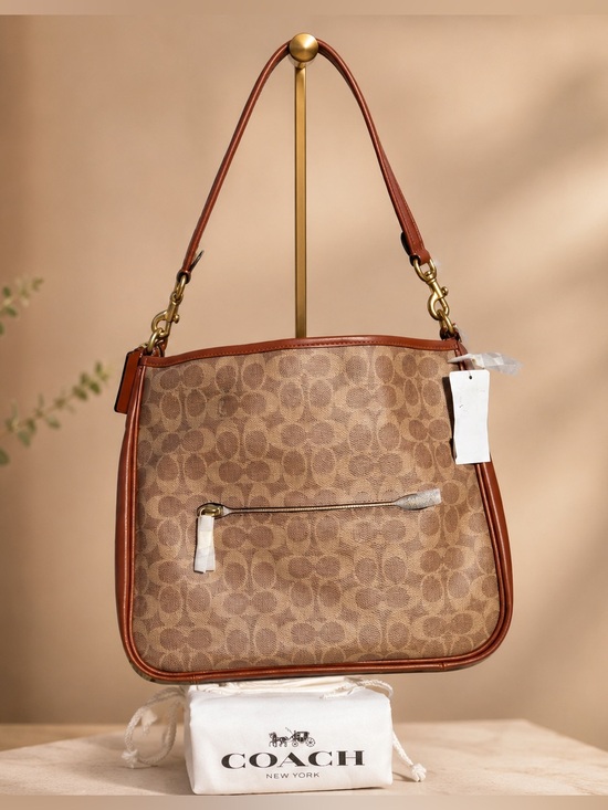 Coach Handbags - Coach Cary Crossbody NWT in Signature Canvas Rust/Cognac w/Coach Dustbag